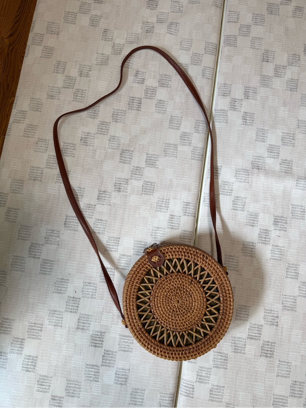 Round Woven Crossbody Bag in Brown
